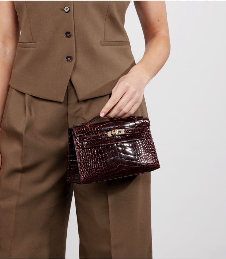 HERMES Kelly Pochette Bordeaux Croc GHW